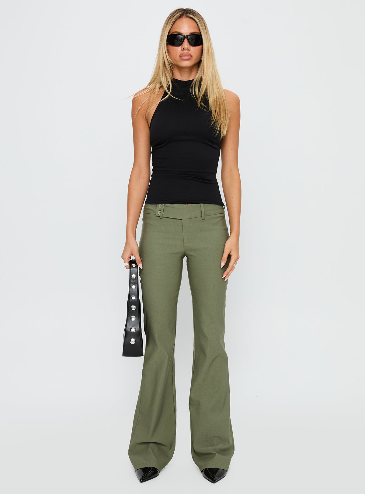 front view of model wearing Princess Polly Kinkirk Flared Pants Olive Green Low Rise Pants Pants 