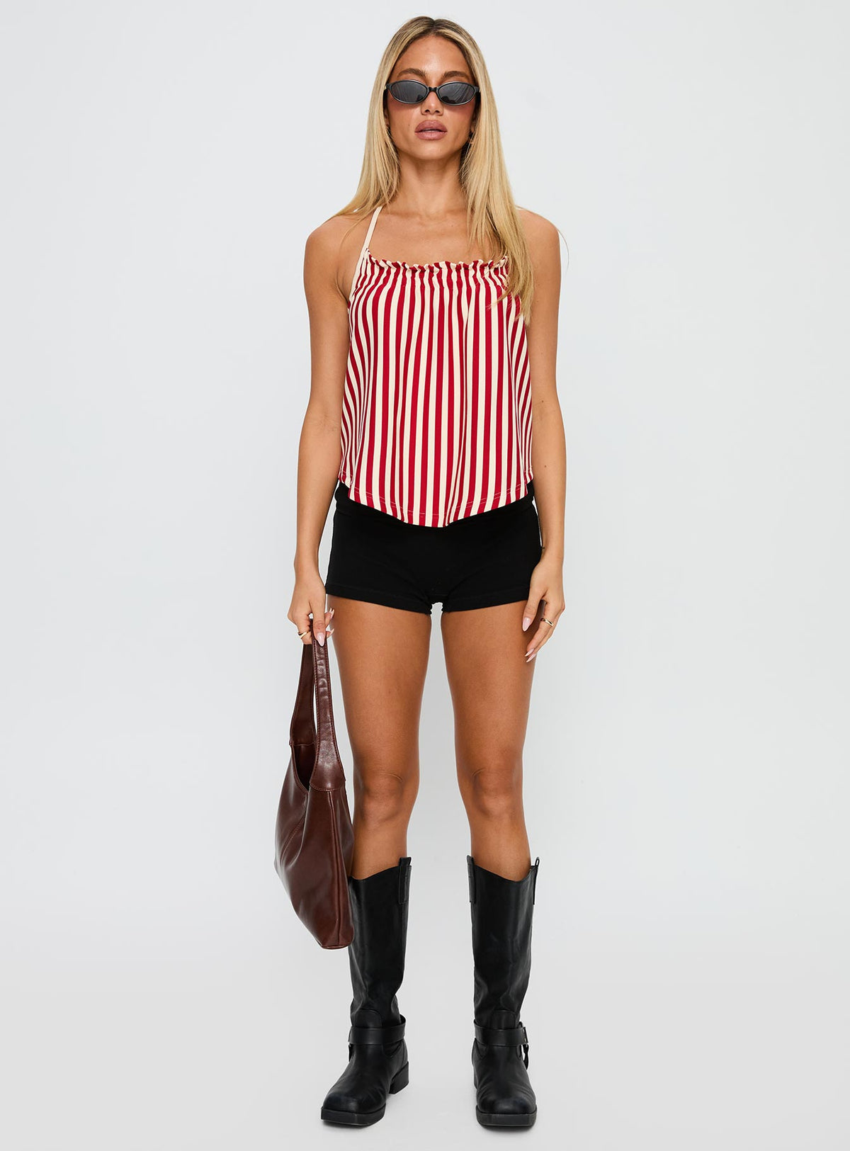 side view of model wearing Princess Polly Full Of Flash Top Red Stripe Sleeveless Square Neck 