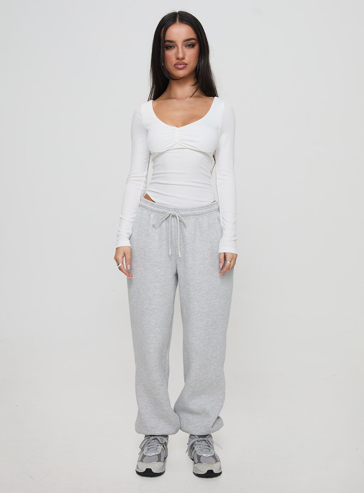 side view of model wearing Princess Polly Lunella Bodysuit White Long Sleeve Tops Bodysuit 