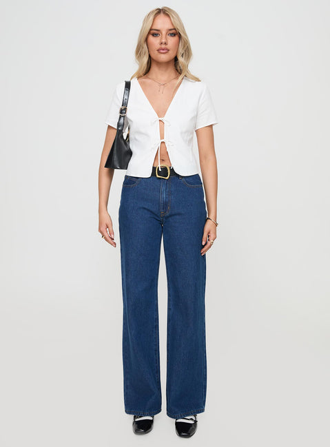 front view of model wearing Princess Polly Corriander Shirt White Short Sleeves V-Neck 