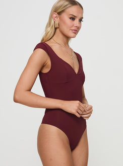 side view of model wearing Princess Polly Zenon Bodysuit Wine Sleeveless Bodysuit 
