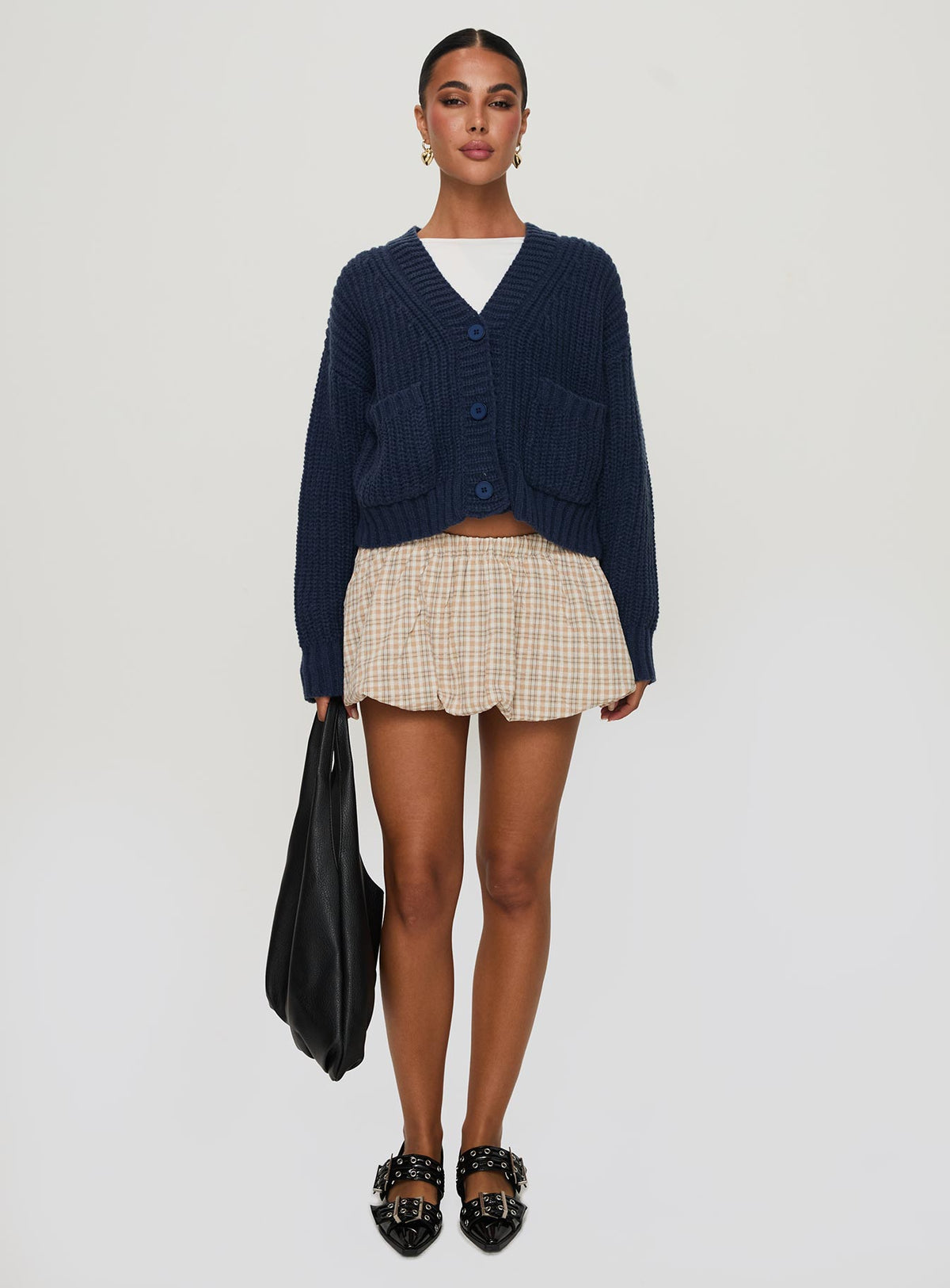 front view of model wearing Princess Polly Osias Cable Knit Cardigan Navy Cropped Jumpers Jumpers 