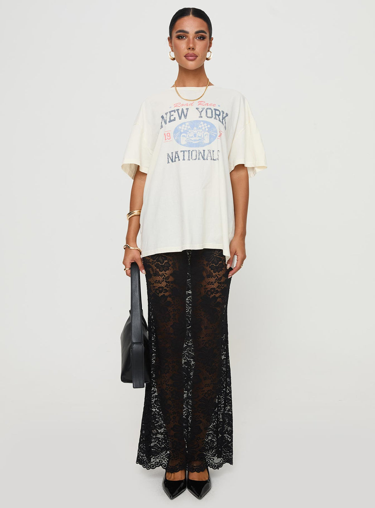 side view of model wearing Princess Polly Road Race Nationals Tee White Half Sleeves Crew Neck 