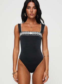 front view of model wearing Princess Polly Keating Bodysuit Black Tall Sleeveless Bodysuit 