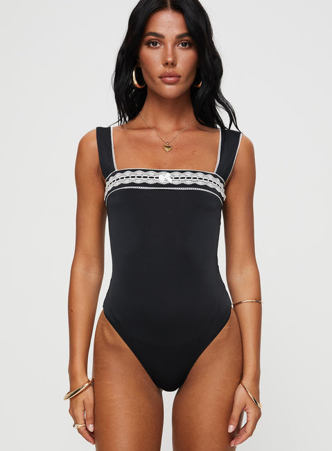 front view of model wearing Princess Polly Keating Bodysuit Black Sleeveless Bodysuit 