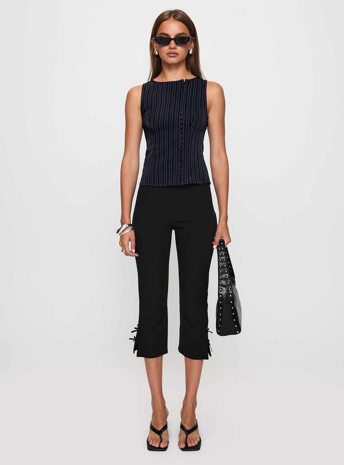 front view of model wearing Princess Polly Running Wild Top Blue Stripe Sleeveless Crew Neck 