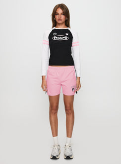front view of model wearing Princess Polly Bend It Athletic Shorts Pink Low Rise Shorts 