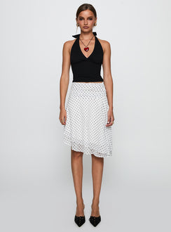   front view of model wearing Princess Polly Evanescence Asymmetrical Midi Skirt White / Polka Dot Midi Skirts 