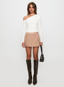 front view of model wearing Princess Polly Beller Long Sleeve Top White Full Sleeves Asymmetric Neckline 