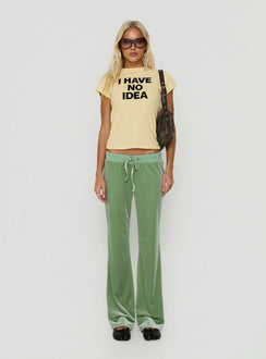Showcasing the Alba Track Pant Sage in womens-regular-pants with mid-rise front view of model wearing Princess Polly
