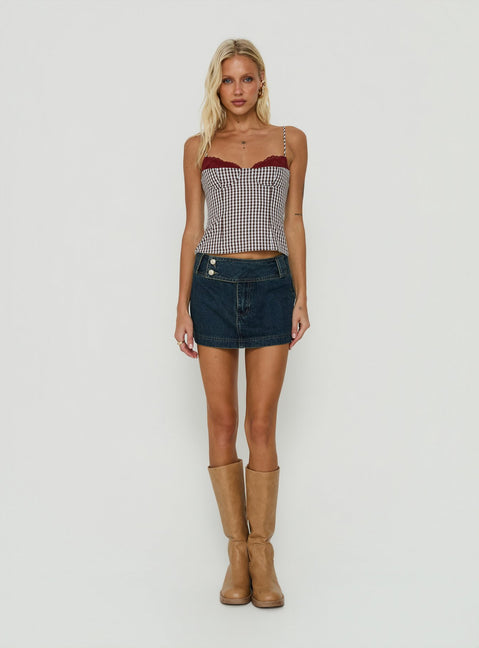 Designed with a-line shape, the Ladena Mid Rise Double Button Mini Skirt Raw Denim womens-skirts features frayed hem Princess Polly