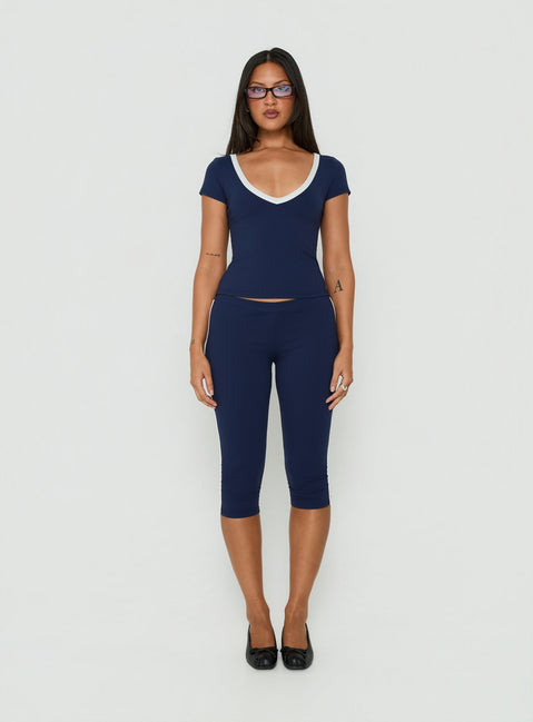 Experience the Rowanna Sporty Capri Pants Navy / Cream womens-regular-pants with high-rise front view of model wearing Princess Polly