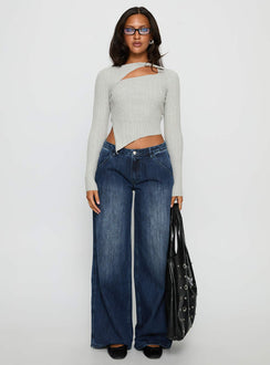 front view of model wearing Princess Polly Downtowner Low Rise Cargo Jeans Mid Blue Wash Low Rise Jeans Jeans 