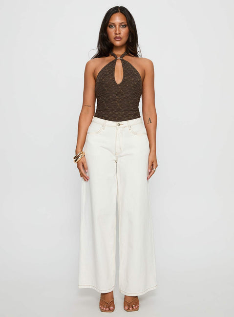 side view of model wearing Princess Polly Libbey Hardware Detail Textured Bodysuit Brown Sleeveless Bodysuit 