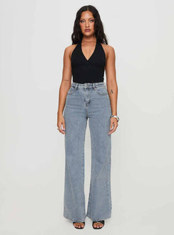 side view of model wearing Princess Polly Thearlie High Flare Jean Light Wash High Waisted 
