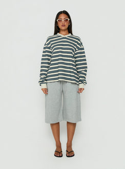 Showcasing the Opollo V Neck Jumper Blue Multi Stripe womens-jumpers with short length front view of model wearing Princess Polly