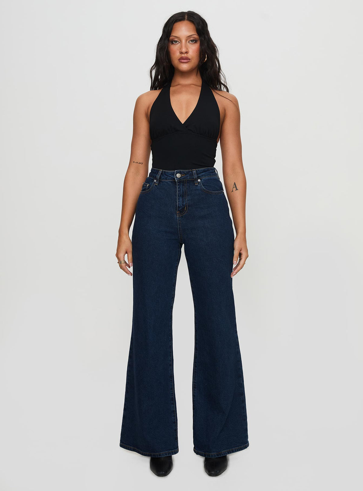 front view of model wearing Princess Polly Thearlie High Flare Jean Dark Wash High Waisted 