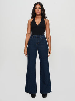 front view of model wearing Princess Polly Thearlie High Flare Jean Dark Wash High Waisted 