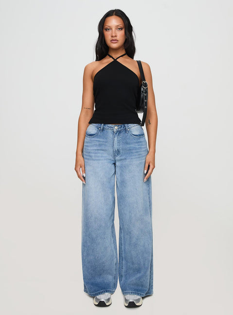 front view of model wearing Princess Polly Baseline Halter Rib Top Black Sleeveless 