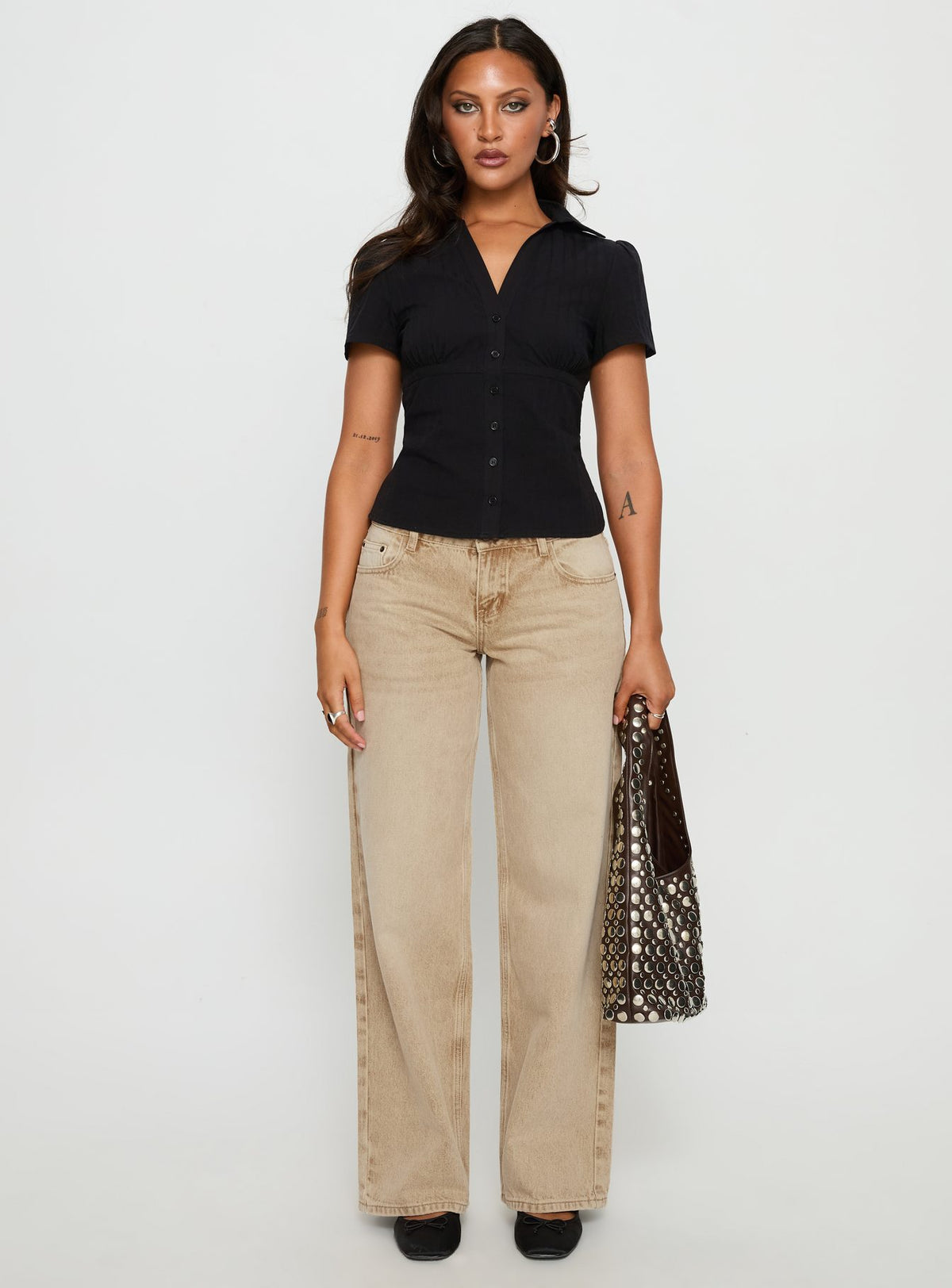 front view of model wearing Princess Polly Ellanor Low Rise Straight Leg Jeans Tan Low Rise Jeans Jeans 