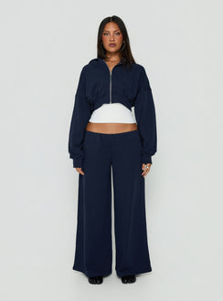 Showcasing the Lanna Fleece Zip Through Cropped Hoodie Navy womens-jumpers with short length front view of model wearing Princess Polly