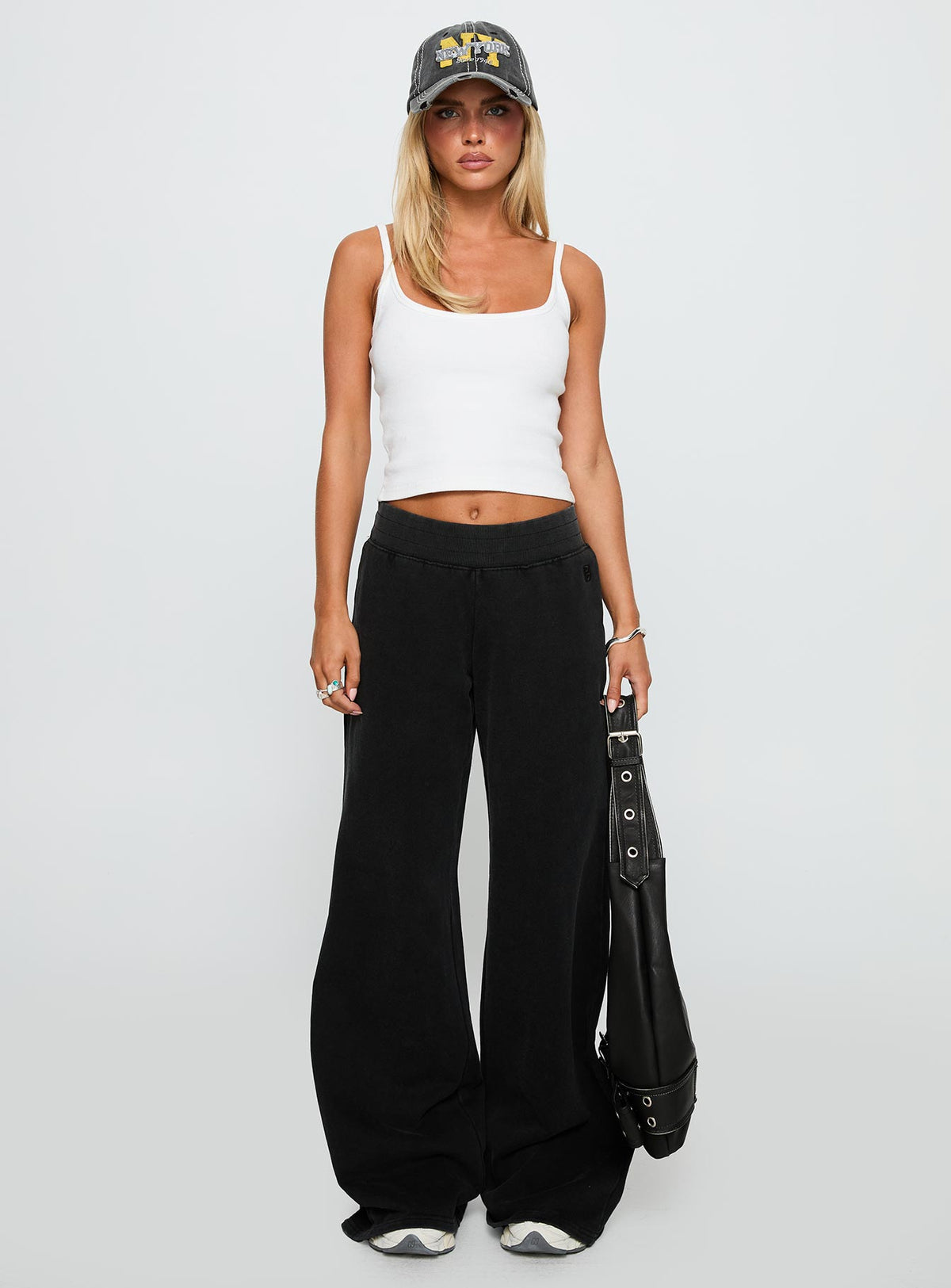 front view of model wearing Princess Polly Summits Flared Track Pants Washed Black High Rise Pants Pants 