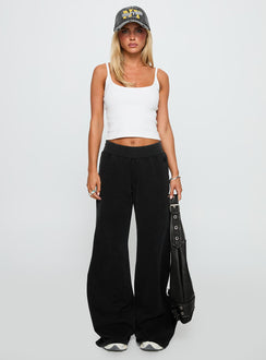 front view of model wearing Princess Polly Summits Flared Track Pants Washed Black High Rise Pants Pants 