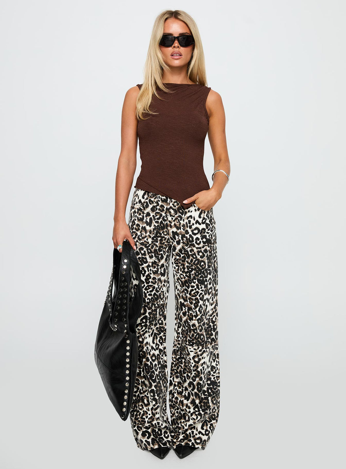 side view of model wearing Princess Polly Lefort Tank Top Chocolate Sleeveless Crew Neck 
