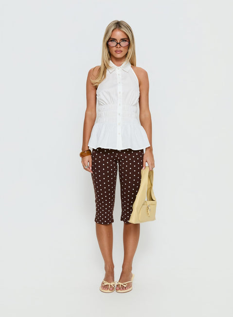 front view of model wearing Princess Polly Samaira Capri Pant Brown Polka Dot Mid Rise Pants Pants 