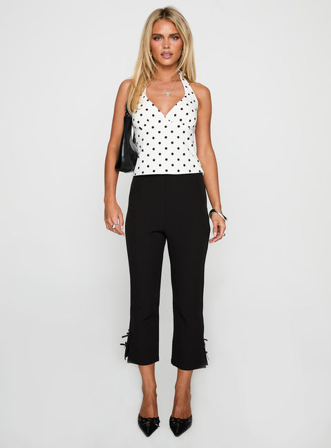 front view of model wearing Princess Polly Alter Of Love Halter Top White / Polka Dot Sleeveless Plunger 
