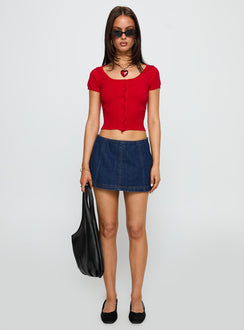 side view of model wearing Princess Polly Lemoni Skort Denim Blue Low Rise Shorts 
