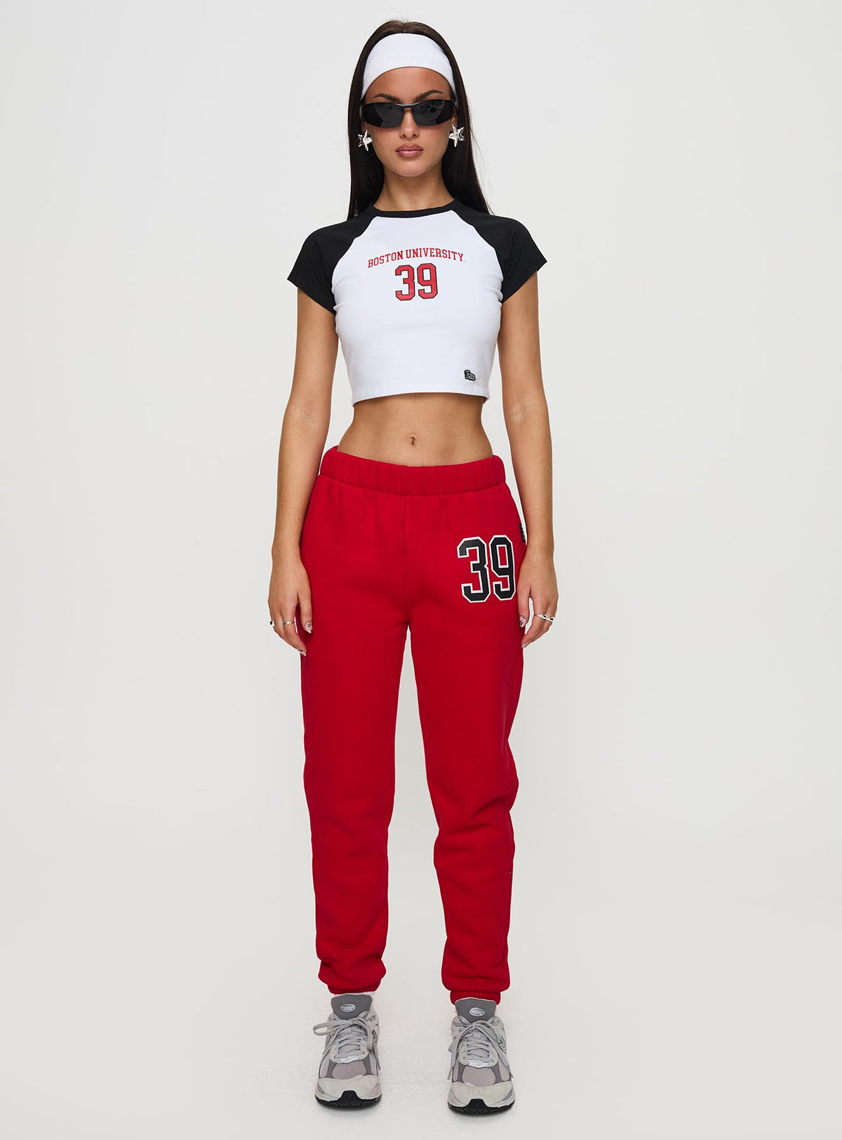side view of model wearing Princess Polly Boston Homerun Graphic Top White / Black Short Sleeves Crew Neck 