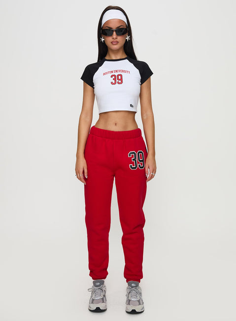 side view of model wearing Princess Polly Boston Homerun Graphic Top White / Black Short Sleeves Crew Neck 