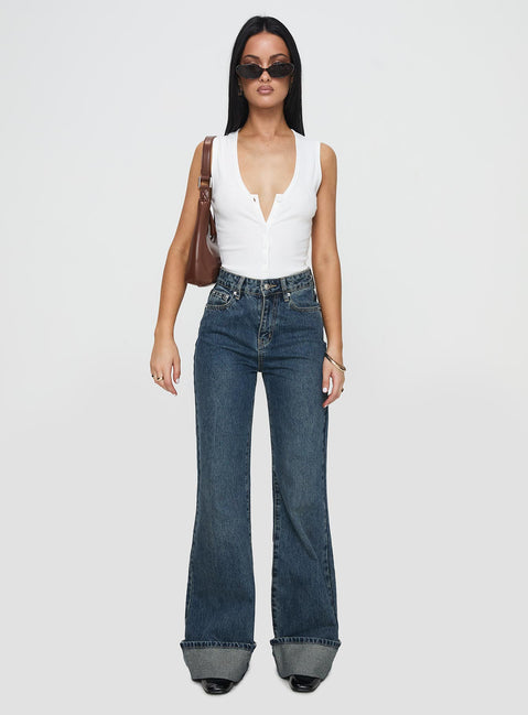 front view of model wearing Princess Polly Florida Keys Cuffed Jeans Mid Blue High Waisted 