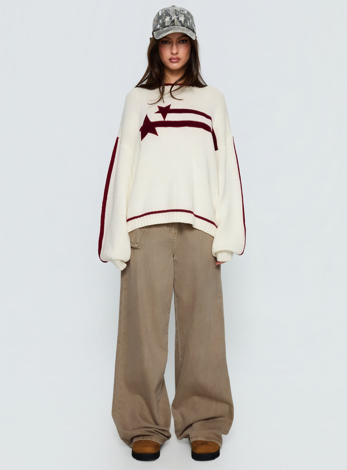 front view of model wearing Princess Polly Star Track Graphic Jumper Cream / Red Longline Jumpers Jumpers 