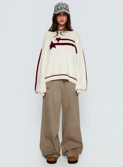 front view of model wearing Princess Polly Star Track Graphic Jumper Cream / Red Longline Jumpers Jumpers 