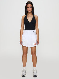   front view of model wearing Princess Polly USC Tennis Skort White Skirts 