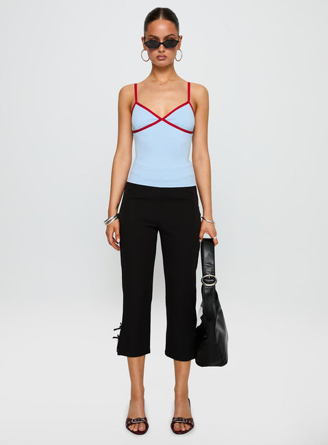 front view of model wearing Princess Polly Tiera Top Blue / Red Sleeveless V-Neck 