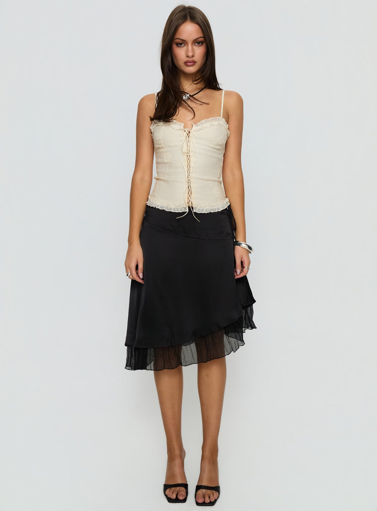   front view of model wearing Princess Polly Rosemead Satin Midi Skirt Black Midi Skirts Skirts 
