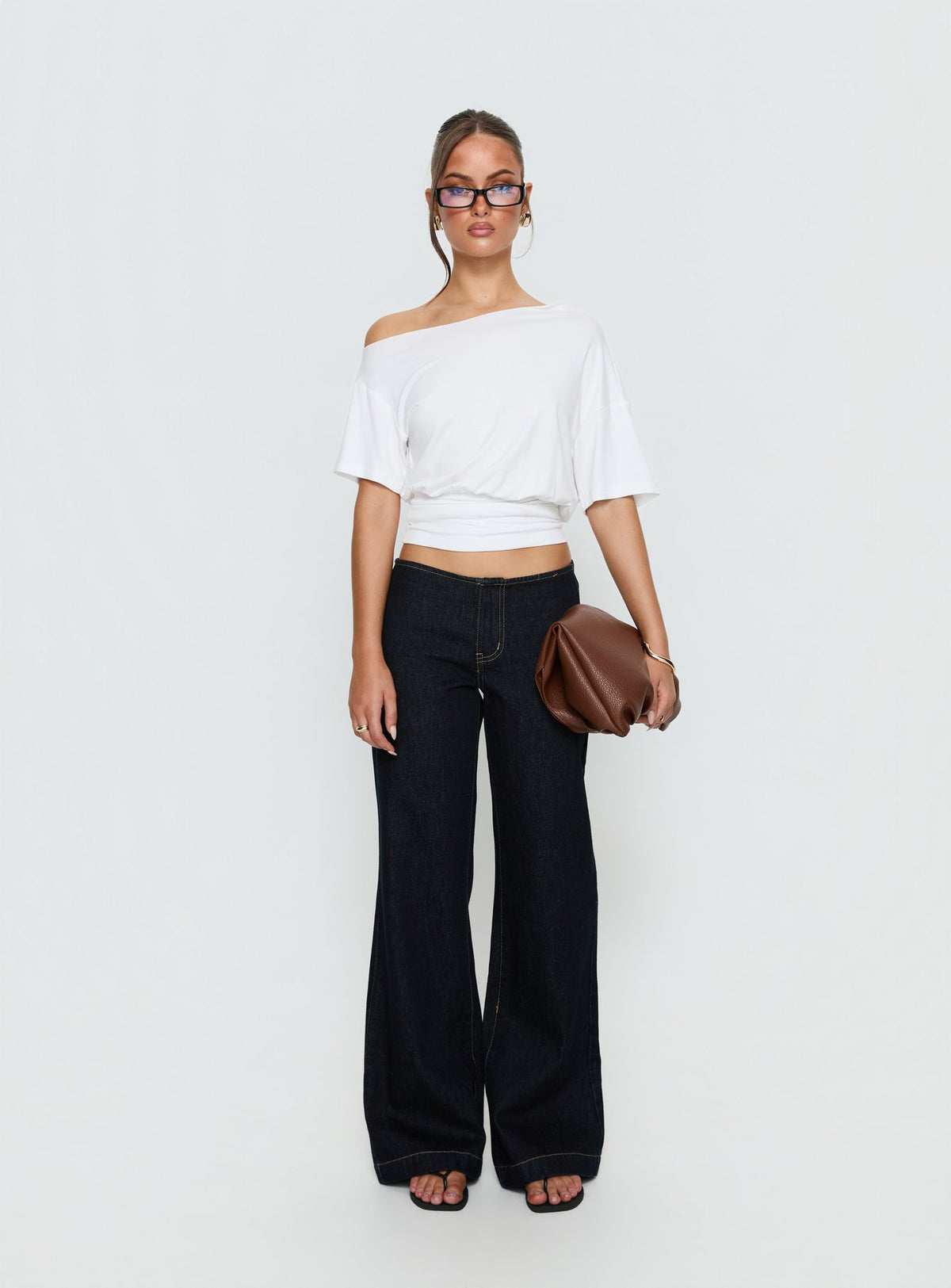 Showcasing Buenos No Waist Low Rise Straight Leg Jeans in Raw Denim womens-jeans with low-rise waist front view of model wearing
