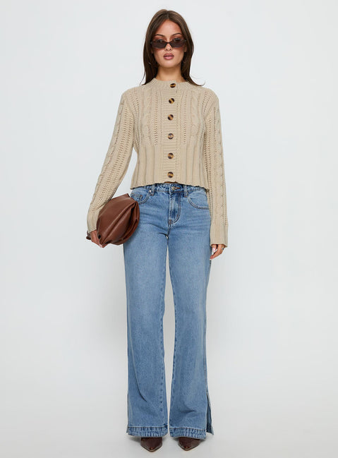 side view of model wearing Princess Polly Donielle Cable Knit Cardigan Beige cropped Jumpers 