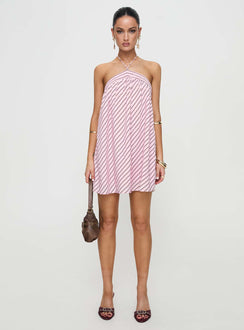 side view of model wearing Princess Polly Moonlit Mini Dress Pink Stripe Petite Asymmetric Neckline 