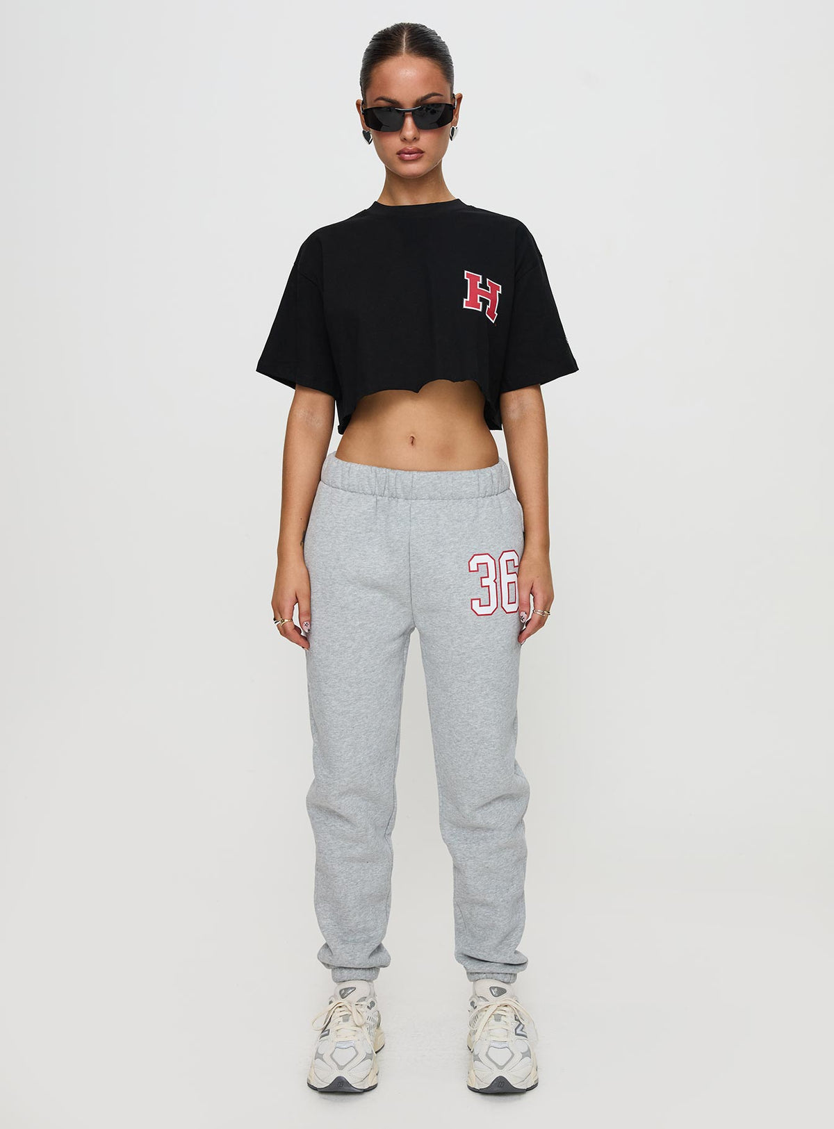 side view of model wearing Princess Polly Harvard Sweatpants Grey Pants 