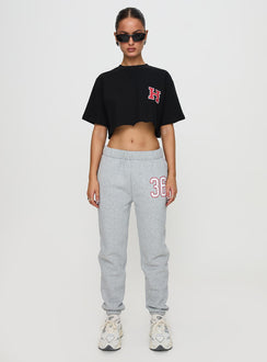 side view of model wearing Princess Polly Harvard Sweatpants Grey Pants 