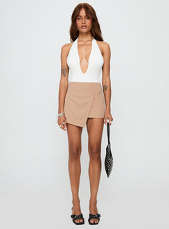   front view of model wearing Princess Polly Strangers Mini Skirt Beige Mini Skirts Skirts 