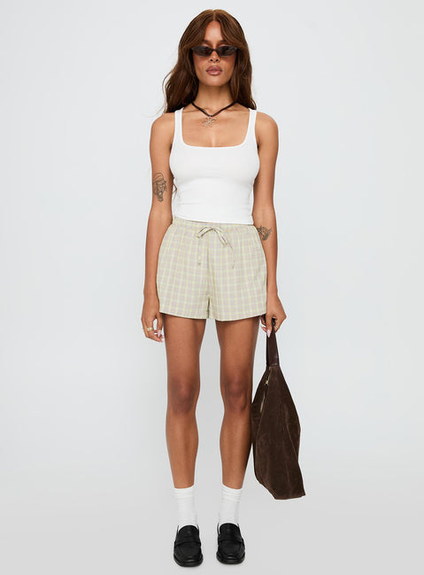 front view of model wearing Princess Polly Star Blaze Shorts Green Check High Waisted Shorts 