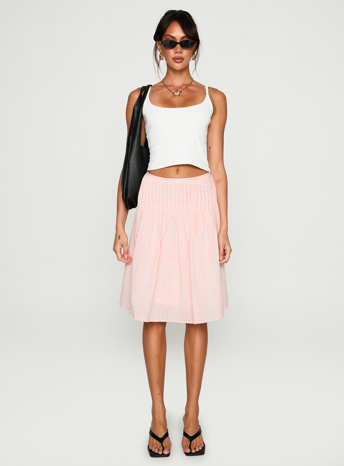   side view of model wearing Princess Polly Maryanna Midi Skirt Pink Gingham Skirts 