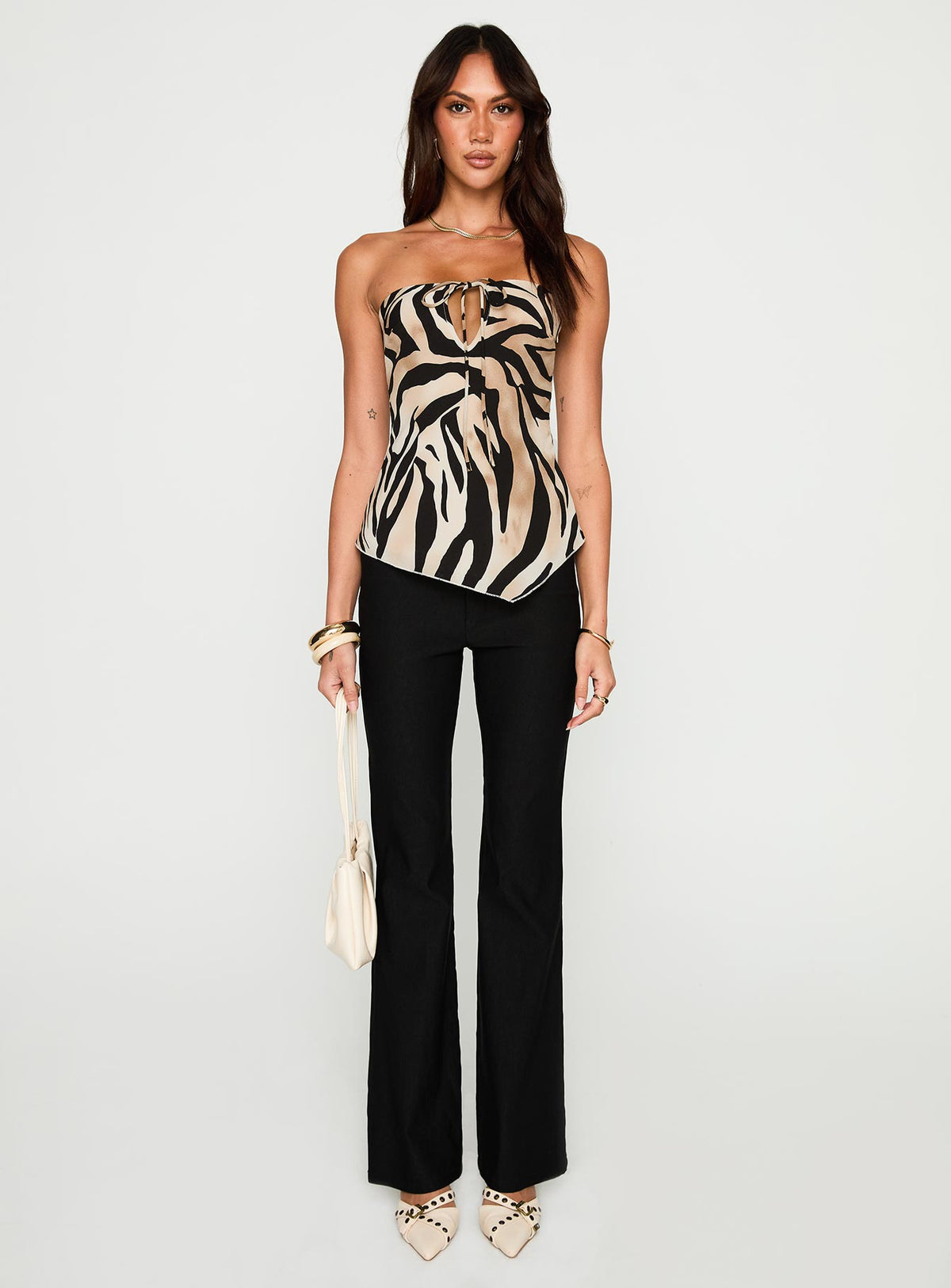 front view of model wearing Princess Polly I Wonder Strapless Cut Out Top Tiger Sleeveless straight 