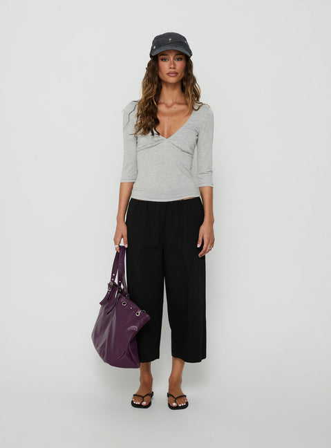 Featuring the Lunea Concealed Waistband 3/4 Pant Black Petite in womens-regular-pants with high-rise front view of model wearing Princess Polly