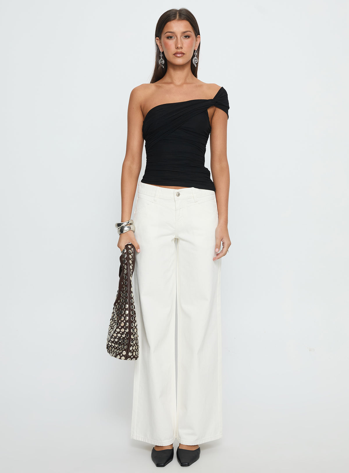 front view of model wearing Princess Polly Catiana Low Rise Wide Leg Jeans White Low Rise Jeans Jeans 